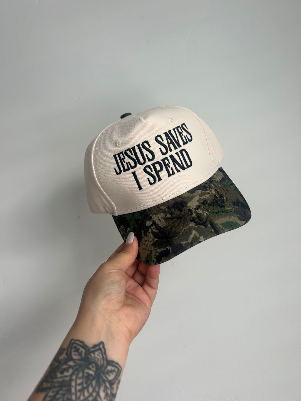 JESUS SAVES I SPEND